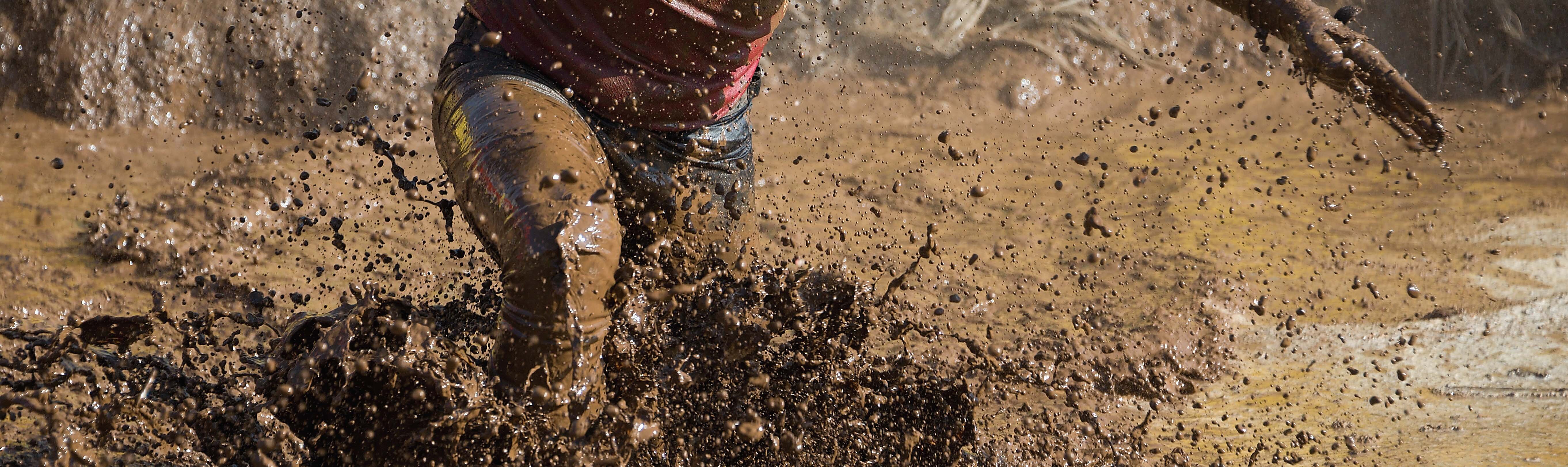 Person running in mud